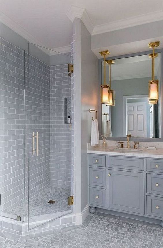 Light coloured tiles make a small bathroom look bigger